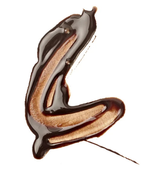 Шоколадный сироп протекает пятна грязной сладкой пищи — стоковое фото