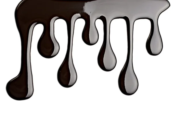 Chocolade siroop lekkende van stroom zoete voedsel — Stockfoto