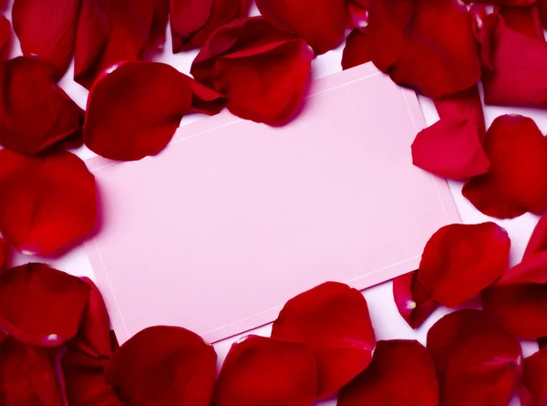 Biglietto di auguri nota petali di rosa celebrazione amore di Natale Immagini Stock Royalty Free