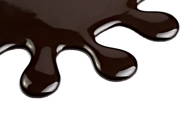 Sirop de chocolat fuyant tache sale nourriture sucrée — Photo