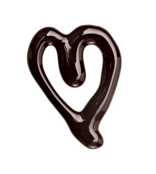 Sciroppo di cioccolato a forma di cuore che perde amore dolce cibo — Foto Stock