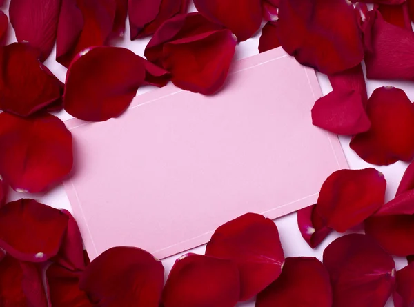 Biglietto di auguri nota petali di rosa celebrazione amore di Natale Foto Stock