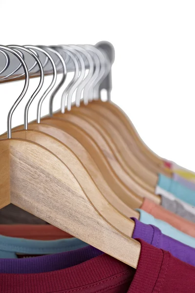 T shirts on cloth hangers — Stock Photo, Image