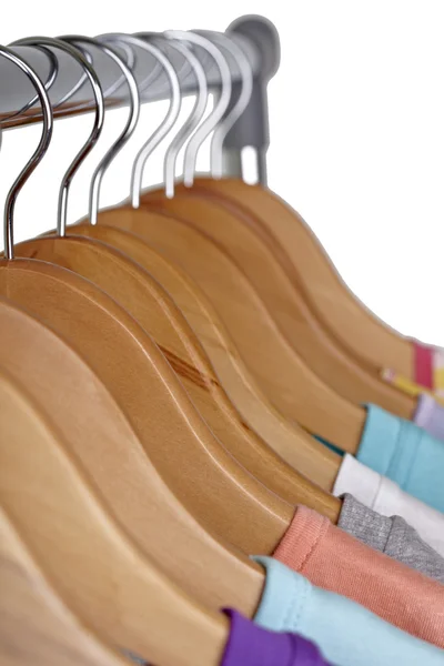 stock image T shirts on cloth hangers