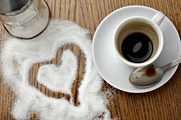 stock image Coffe cup drink and love heart shape in sugar