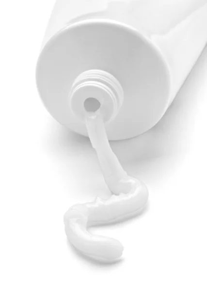 Bílý krém trubice výrobek pro péči o tělo — Stock fotografie