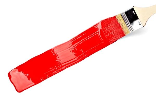 Червона лінія фарби слід і пензлик — стокове фото