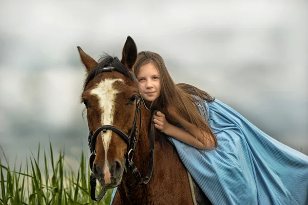 Beautiful girl with horse on nature — Stock Photo, Image