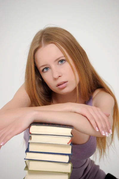 Mujer joven con libros —  Fotos de Stock