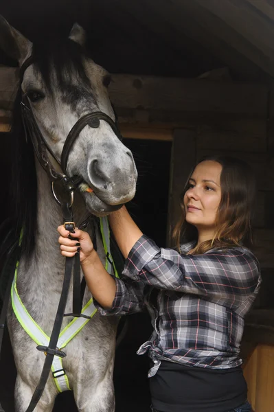 stock image Girl in the stables