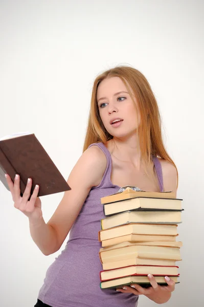 Студент с книгами — стоковое фото