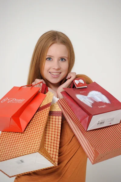 Mulher com compras — Fotografia de Stock