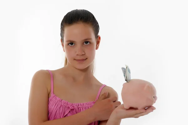Mosolygó lány Holding Piggy Bank — Stock Fotó