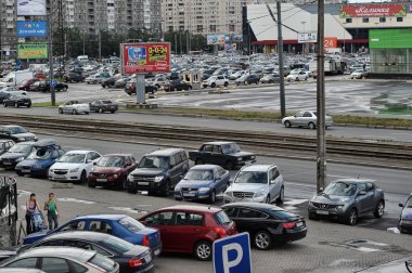 Parking in front of a supermarket, Russia, Saint - Petersburg clipart