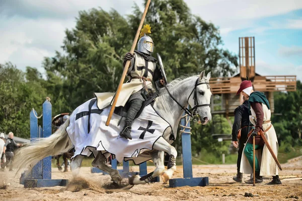 stock image A knight riding fast horse