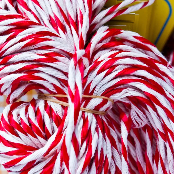 stock image Group of white and red ropes with yellow cards