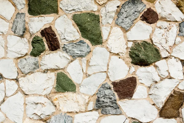Verschillende kleuren stenen muur — Stockfoto