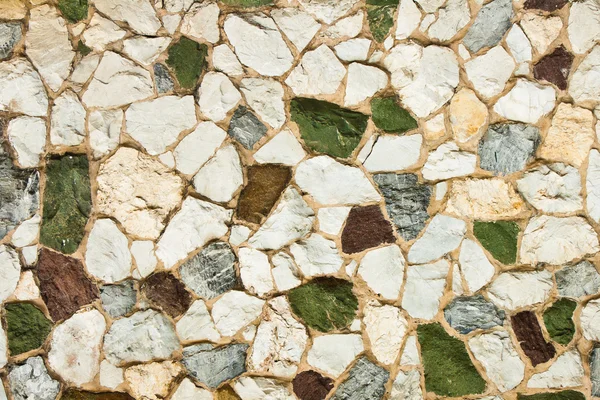 Каменная стена различных цветов — стоковое фото