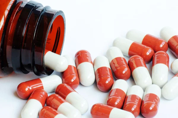 Red-and-white capsules — Stock Photo, Image