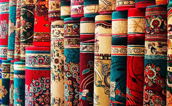 Persian blankets at a market Stock Picture