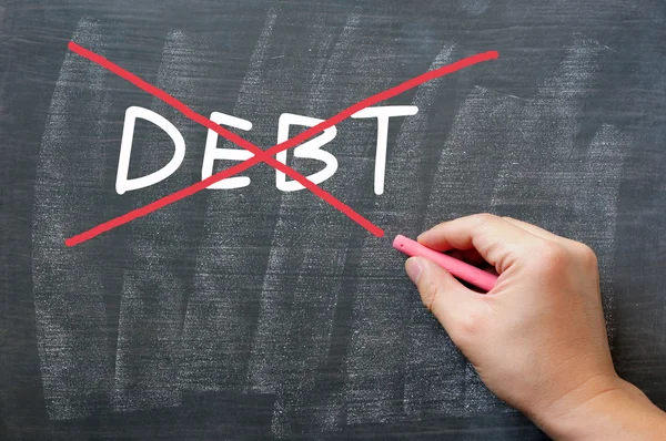 Debt being crossed out — Stock Photo, Image