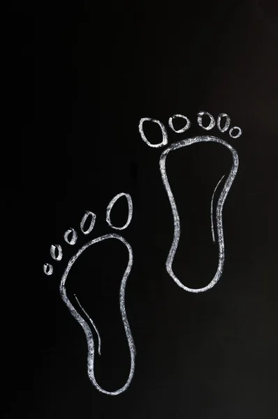 Footprints drawn with chalk — Stock Photo, Image
