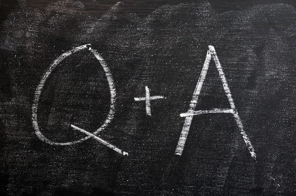 Question and Answer symbols on a blackboard — Stock Photo, Image