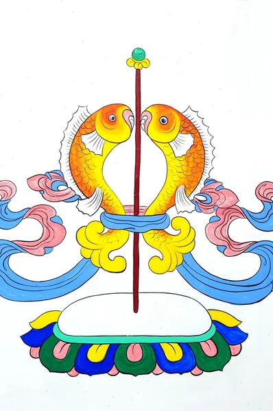 Ancient Tibetan wall painting art of golden fish — Stock Photo, Image