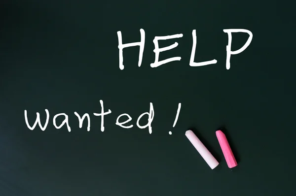 Help wanted - written with chalk on a green chalkboard background — Stock Photo, Image