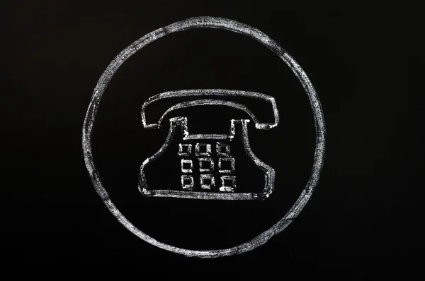 Tebeşir ile tahta zemin üzerine çizilmiş eski telefon simgesi — Stok fotoğraf