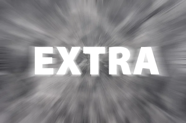 Krita ritning av "extra" ord skrivet på suddiga svarta tavlan — Stockfoto