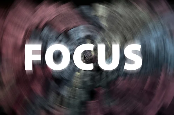 Focus cuvânt cu raze de mișcare pe un fundal tablă de cretă — Fotografie, imagine de stoc