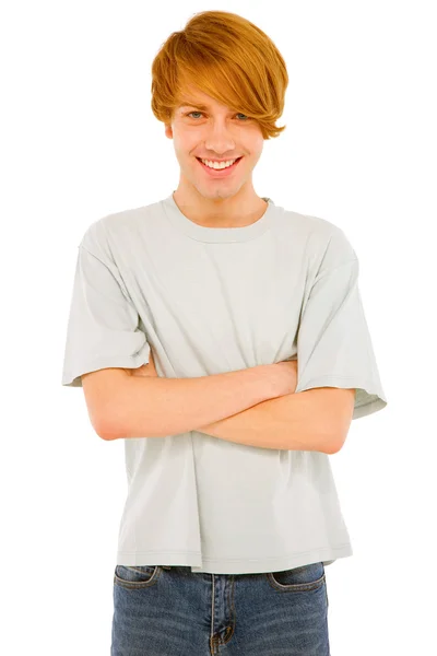 Dospívající chlapec s rukama založenýma na — Stock fotografie