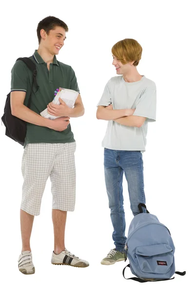 Estudantes adolescentes com mochila e livros — Fotografia de Stock