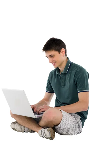 Хлопчик-підліток з ноутбуком — стокове фото