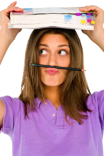 Adolescente gir balanceamento lápis em seu lábio — Fotografia de Stock