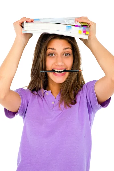 十几岁的女孩用铅笔在嘴和书 — 图库照片