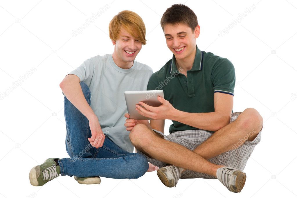 Teenage boys using ipad