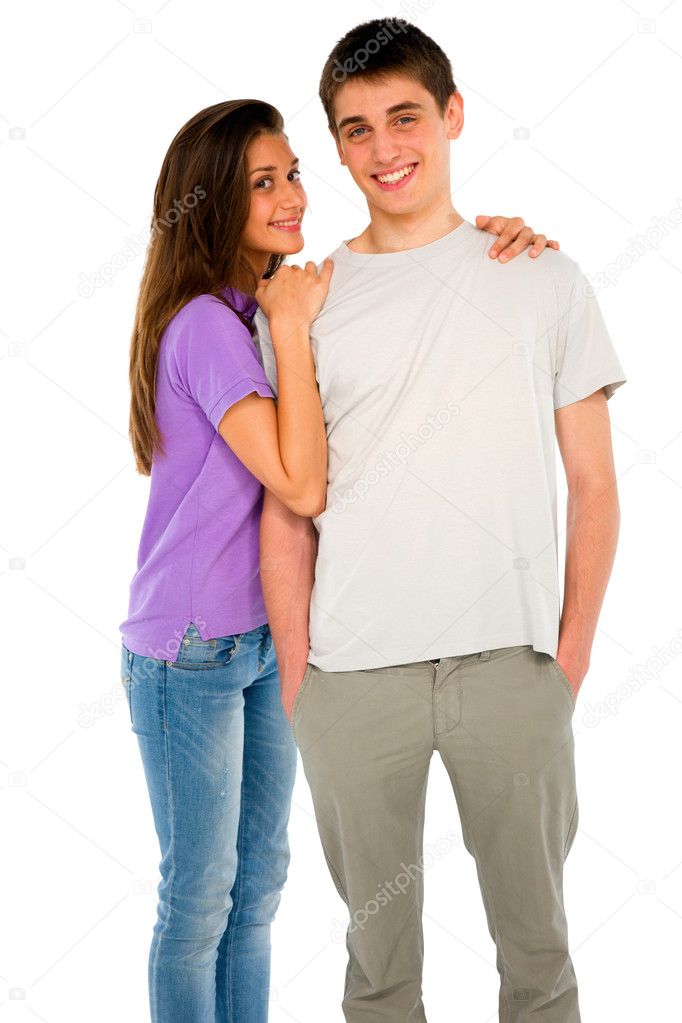 Teenage girl embracing teenage boy