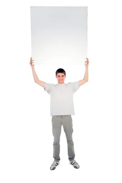 Мальчик-подросток с белой панелью — стоковое фото