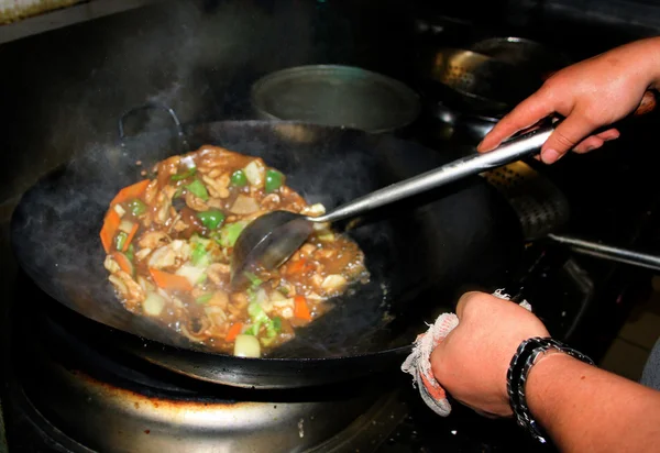 Chinese Restaurant Dish Prepared in Wok Stock Photo