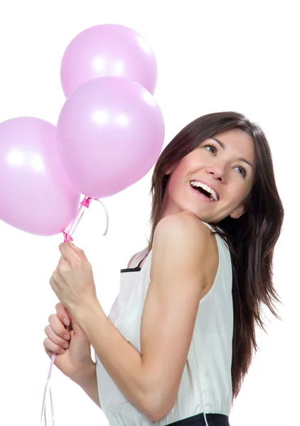 Jovem menina feliz com balões rosa — Fotografia de Stock