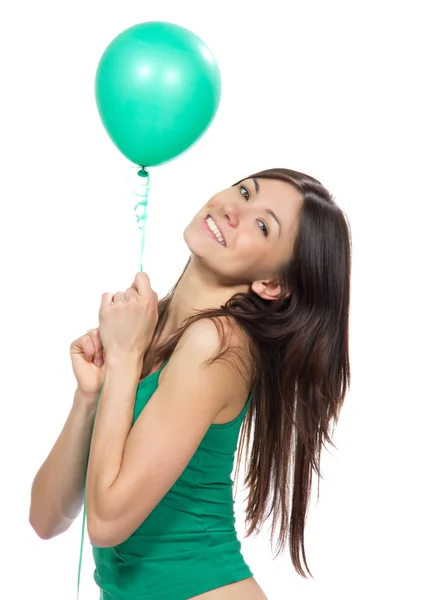 Fiatal, boldog lány zöld léggömb — Stock Fotó