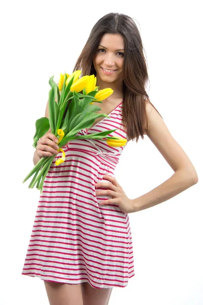 Woman with yellow tulips bouquet of flowers smiling — Stock Photo, Image
