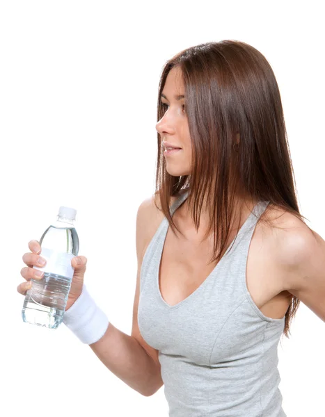 Woman with bottle of drinking water — Stock Photo, Image