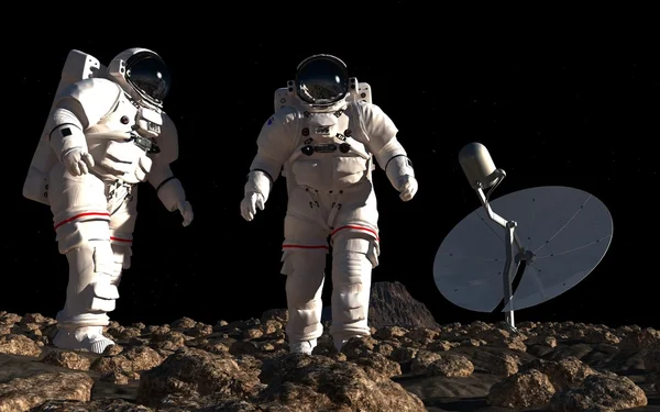 De astronauten op de achtergrond van de planeet. — Stockfoto