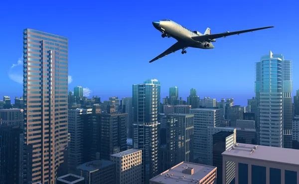 Samolot nad miastem. — Zdjęcie stockowe