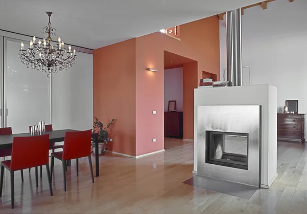 Modern dining room with fireplace — Stock Photo, Image