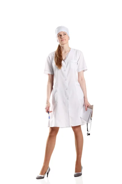 Arzt posiert vor weißem Hintergrund — Stockfoto