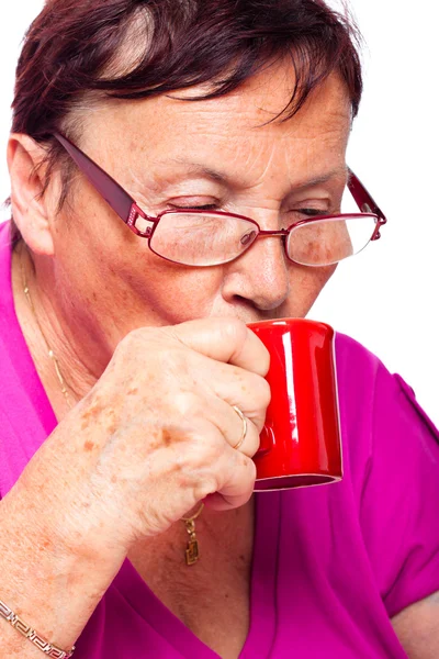 Donna anziana che beve espresso — Foto Stock